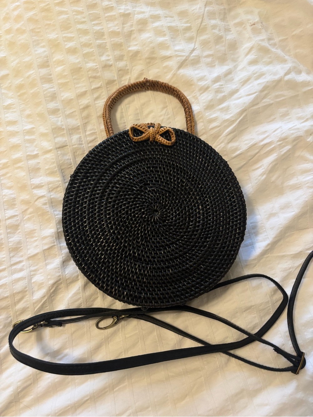 Poppy+Sage Molly Bag. Black Round Woven Straw Crossbody Bag with Tan Handle